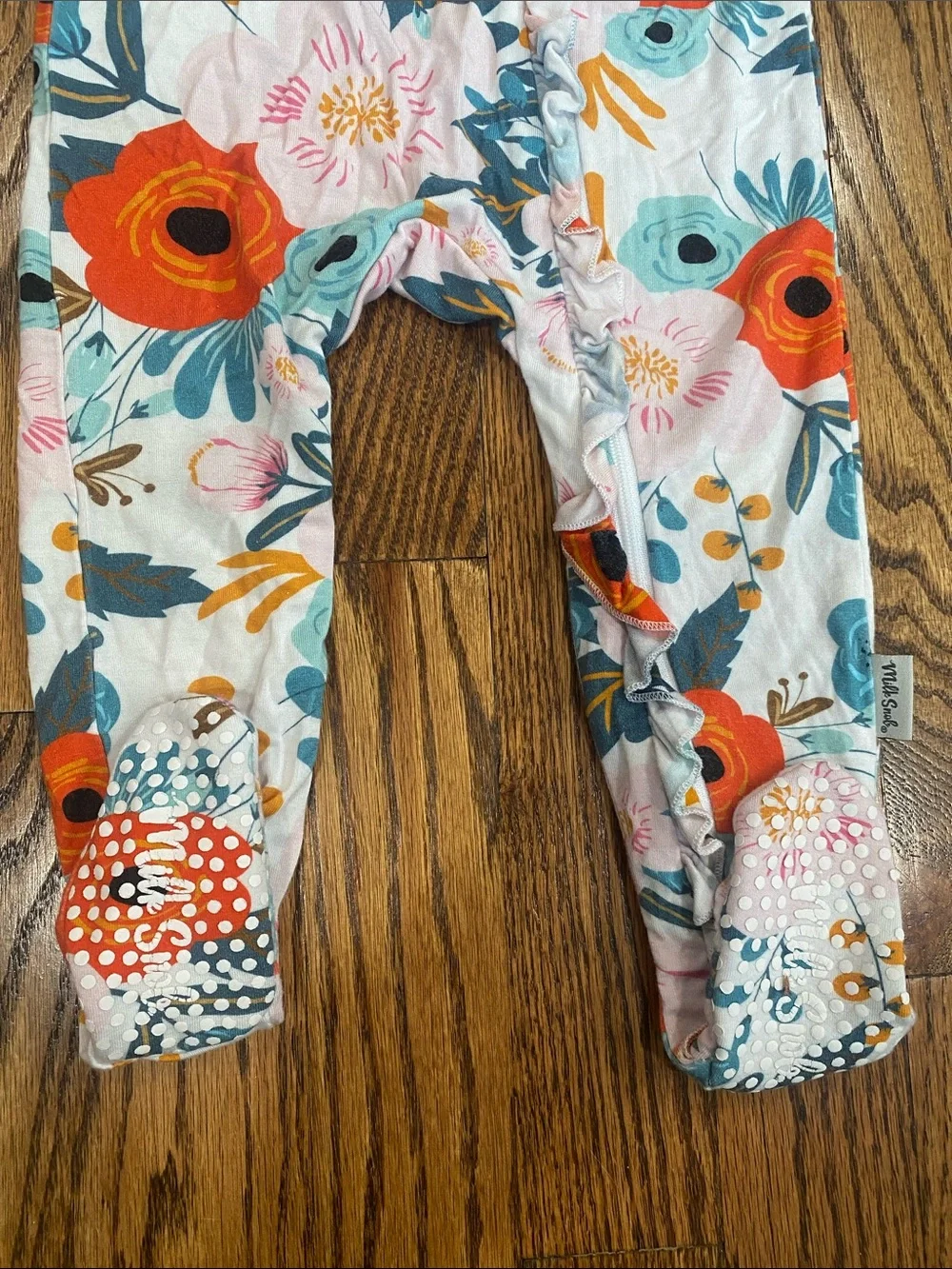 Milk Snob bamboo floral ruffle footie, size 6-12 months. Like new condition